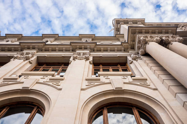 istock Facade of large institutional building with large columns and windows, background sky, low angle shot, in Valencia. 1713232106
