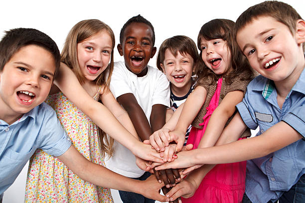 istock Multiracial children putting their hands together 171323216