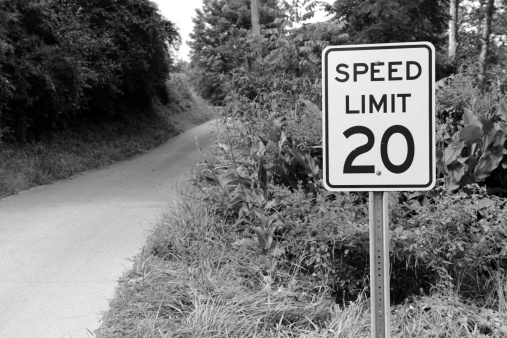 20mph speed limit sign posted on small country road