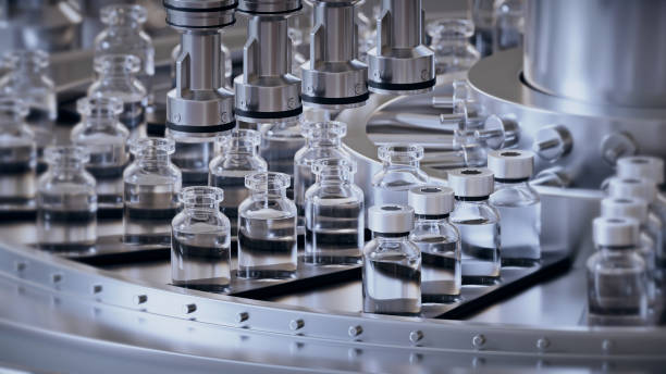 istock 3d render. Pharmaceutical manufacture background with glass bottles with clear liquid on automatic conveyor line. COVID-19 mRNA vaccine production platform 1713234867