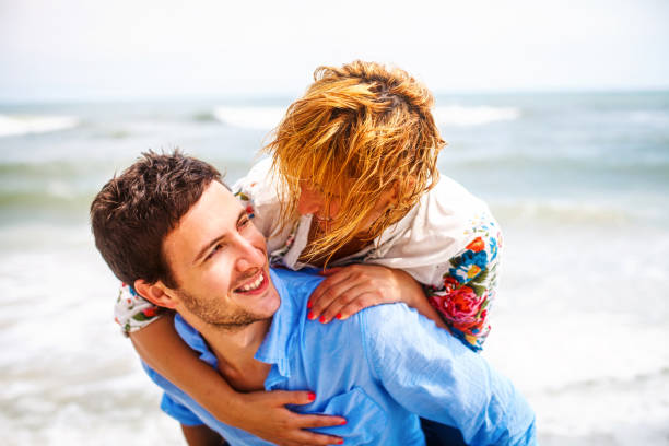 istock Smiling couple on the beach 171323611
