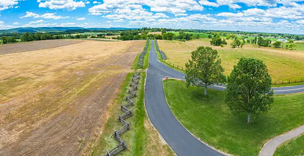 View from the tower at Bloody Lane on the Antietam National Battlefield in Antietam Maryland. The roadway is bordered by a simple split-rail (also known as a log) fence.