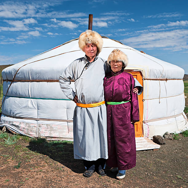 istock Mongolian couple in national clothing 171324373