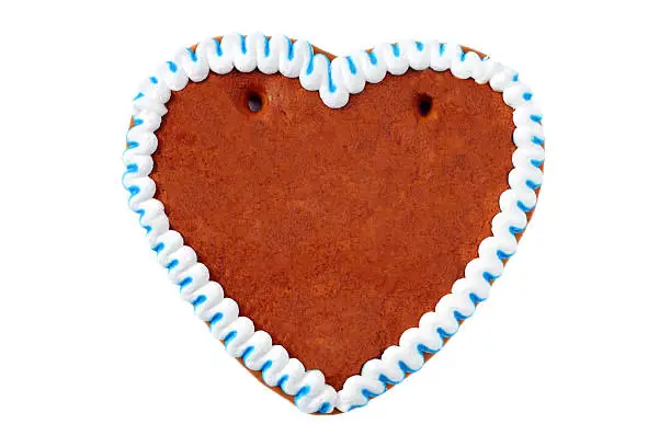 Photo of A gingerbread cookie in the shape of a heart