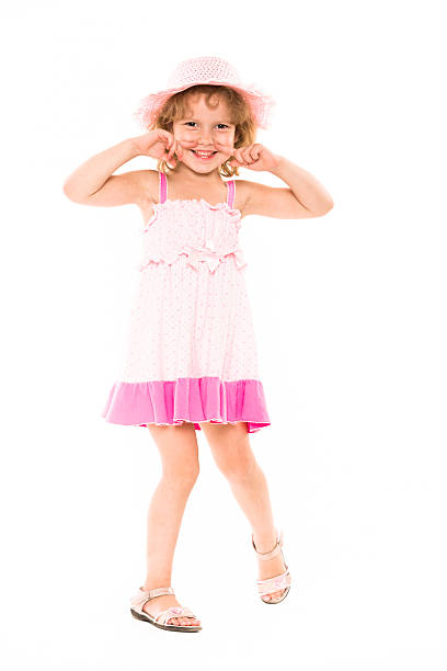 Little four year old girl happy. white background.