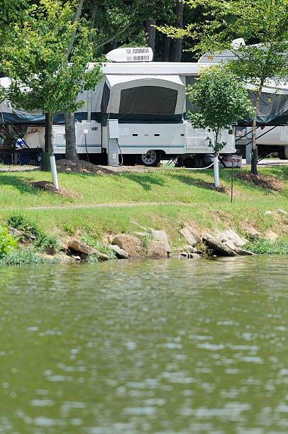 istock RV popup camping near water 171325710