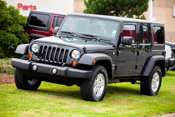 jeep wrangler unlimited sport - jeep wrangler стоковые фото и изображения