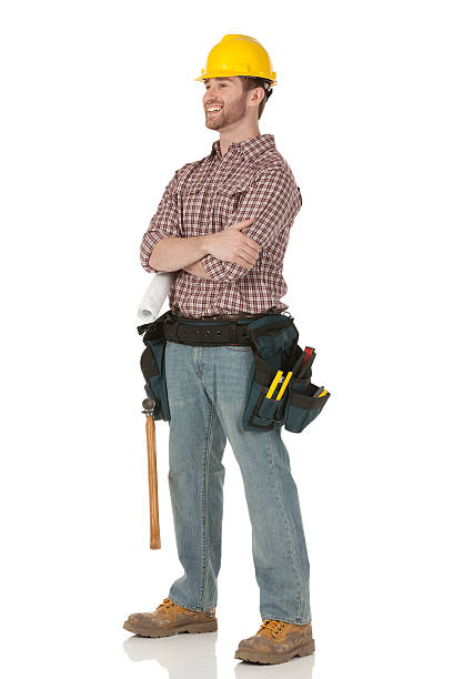 istock Happy construction worker standing with his arms crossed 171326372