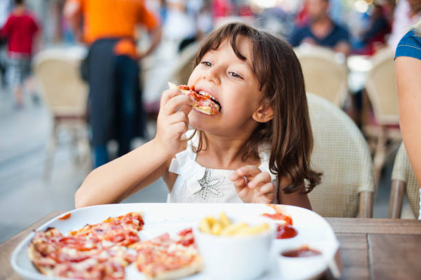 istock Little Girl Enjoying her Meal 171327030
