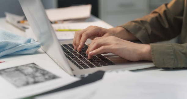 istock Close Up of Project Manager Professional's Hands Swiftly Typing on the Laptop Computer Keyboard in the Office, Skillfully Managing Project Timelines, Resources and Deliverables 1713270859