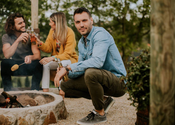 istock Friends having good time and baking corns in the house backyard 1713271678