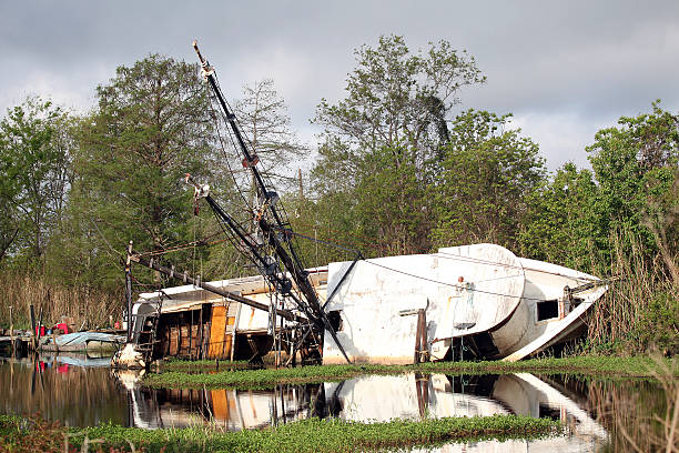 Shrimp boat wreck left from hurricane. stock photo