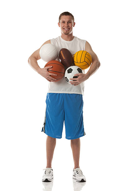 istock Sports man holding assorted balls 171327523