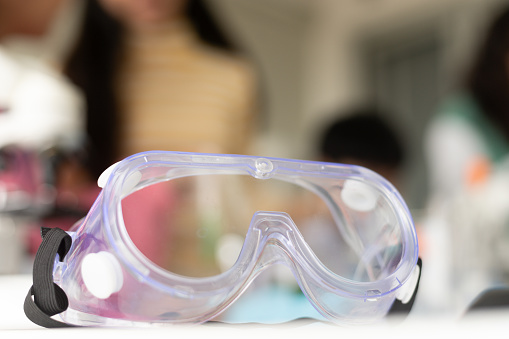 Science equipment in the laboratory. Goggles. Children STEM education theme.