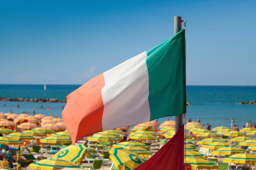Italian Flag on a beach of the Riviera romagnolaOTHER BEACH SCENES FROM ITALY: