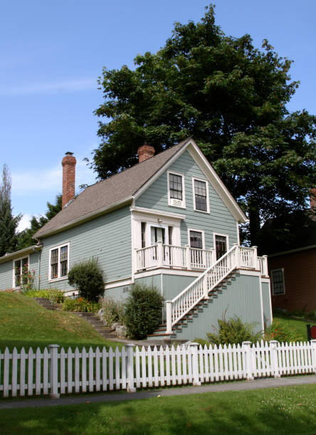 istock Older TWo Story Home With fence 171327918