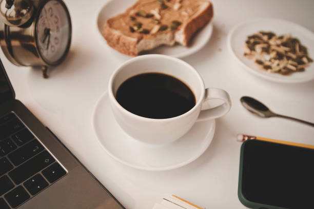 istock Coffee cup hot and using laptop working in the morning 1713279366