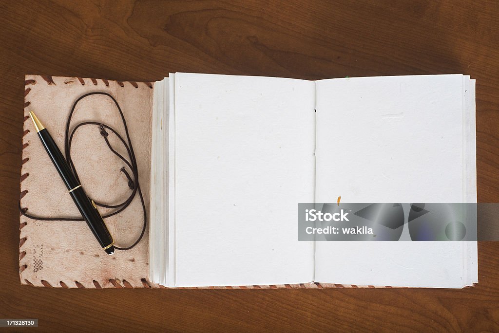 empty leather book diary or guestbook with Ballpoint pen empty leather book. Book is from the german brand Indiary Author Stock Photo