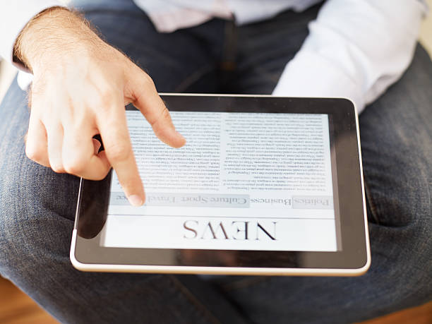 istock man reading news on the digital tablet 171328364