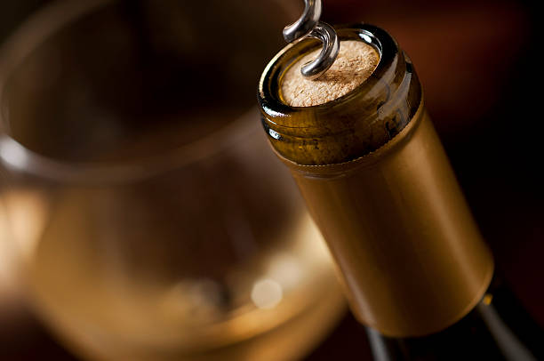 uncorking vino - wine cork wine bottle bottle foto e immagini stock