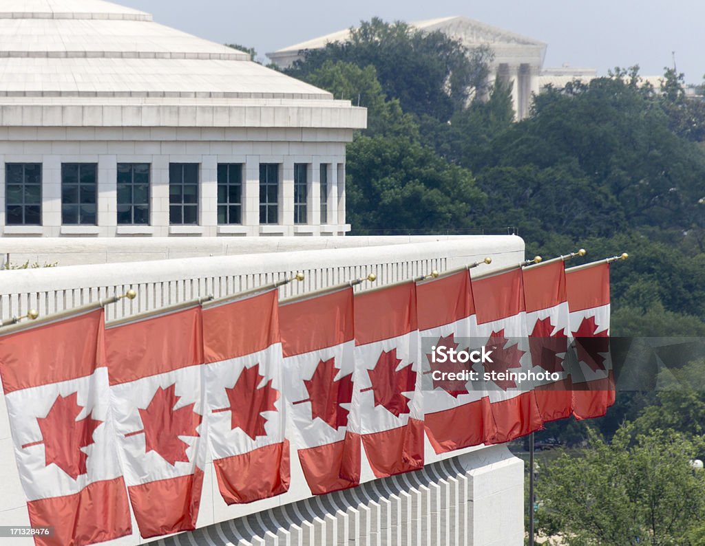 Canadian Embassy In Washington DC Canadian flags fly outside of the embassy in Washington DC. Embassy Stock Photo