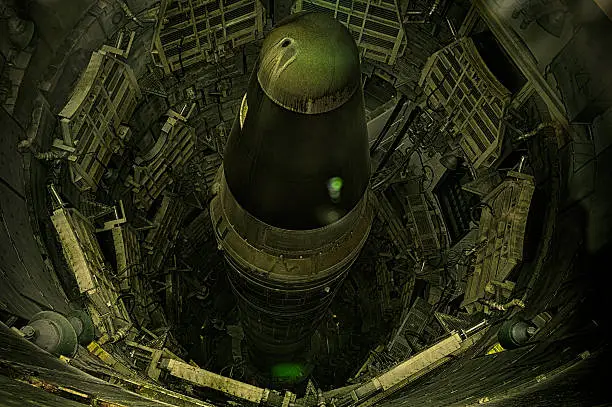 Decommissioned Titan 2 Missile In Sahuarita Arizona.  Underground and ready for launch.   This area is now open to the public and pictures are welcomed.  The image was taken through a window so there is some reflections and blurring that occurs.Visible grain. D3S -  Image was shot at a high ISO and no flash.