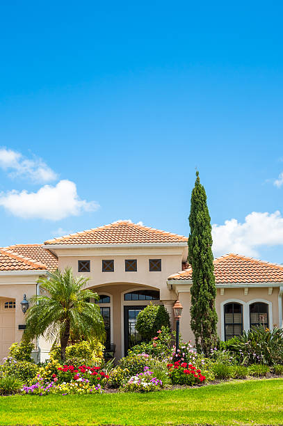 istock Upscale Home with Cypress Tree and Flower Garden 171329407