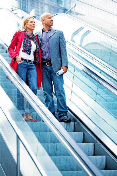 istock mid age tourists visiting Berlin 171329615