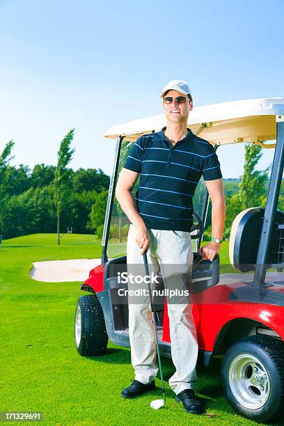 Man Standing Next To A Golf Cart Stock Photo - Download Image Now - Golf, Sunglasses, 40-49 Years