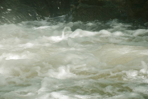 water falling on river pass rock and stone at north Chet Kod waterfall in Thailand