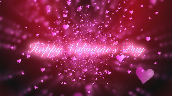 Happy Valentine’s Day greeting on blurred pink heart shape particles on red and black gradient background. Happy Valentine’s day. Abstract background.