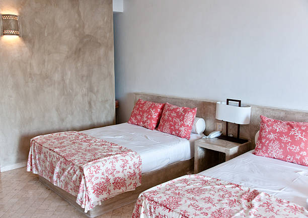 istock simple elegant hotel room with stucco walls and designer bedding 171331018