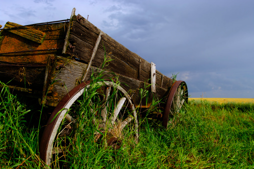 View of an old weathered wagon from the Canadian prairies.