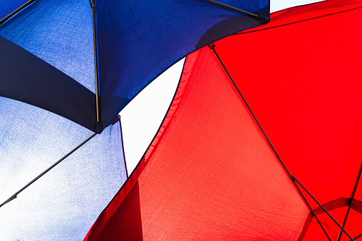3D Rendering Umbrella Standing out from the Crowd, Leadership Concept.