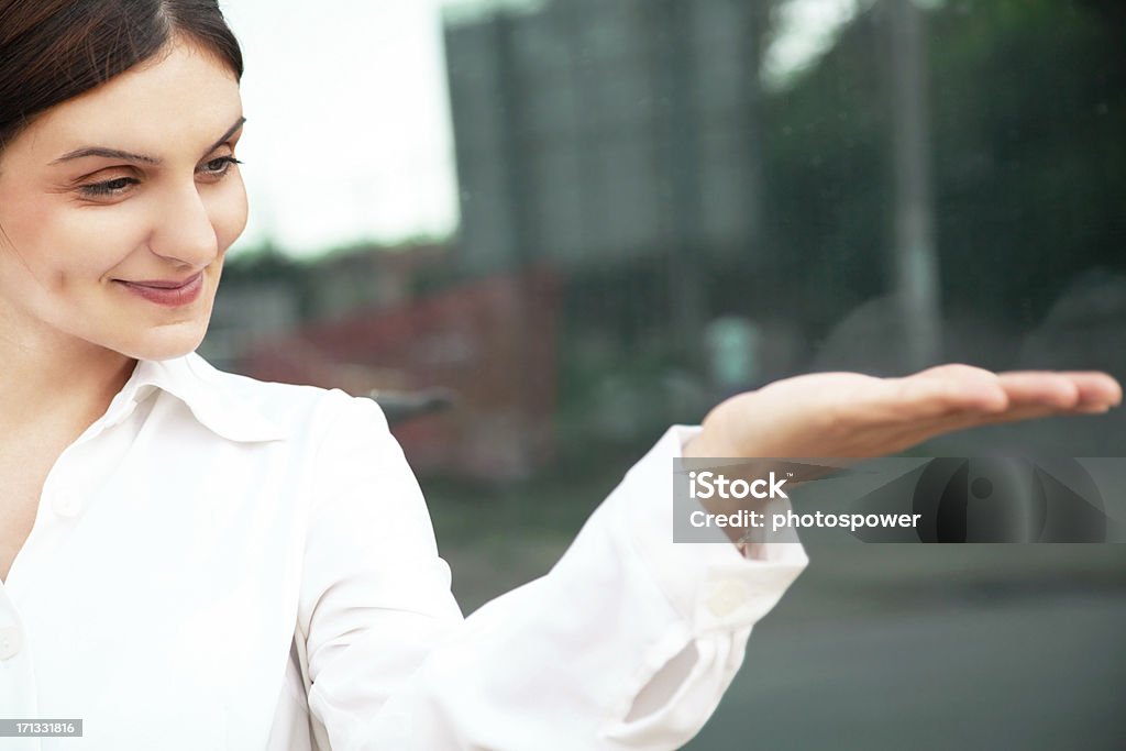 Businesswoman Businesswoman giving hand. 30-39 Years Stock Photo