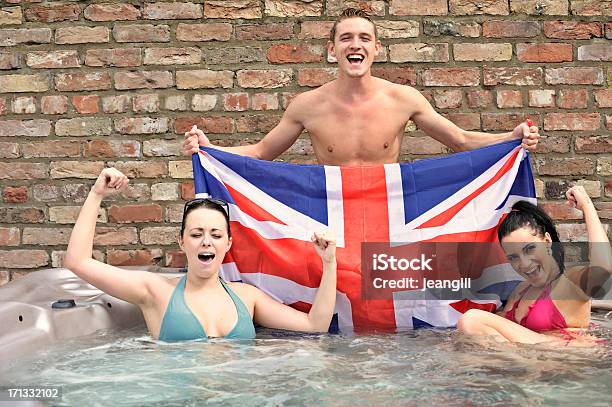 Happy Uk Supporters In Hot Tub Stock Photo - Download Image Now - One Piece Swimsuit, UK, British Culture