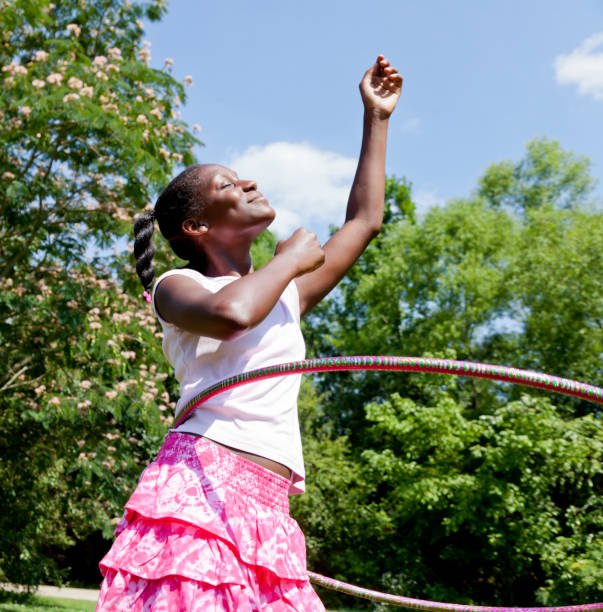 istock Little Girl Hula Hooping 171332156