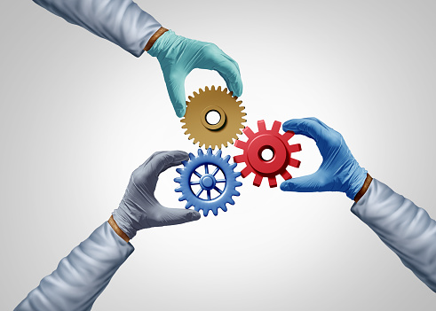 Medical staff teamwork and health care community collaborating together for combined success as a medicine team Health care symbol for innovation as a doctor nurse and Hospital worker with connected gears and cogs.