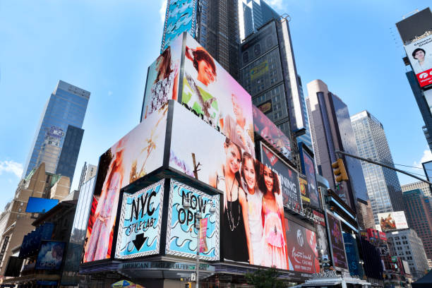 Broadway "New York City, USA - June 16, 2012: Colorful advertising billboards and skyscrapers at the intersection of Broadway + 46th Street in Times Square, Manhattan." retail digital signage stock pictures, royalty-free photos & images