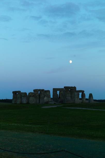 istock Prehistoric Stonehenge Stone Circle at moonlight 1713325341