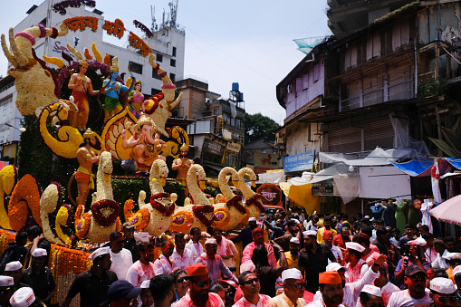 Pune, India - September 29, 2023, Guruji Talim Ganpati, Pune Ganpati Visarjan Procession with The Rhythm of Traditional Dhol Tasha Music.
