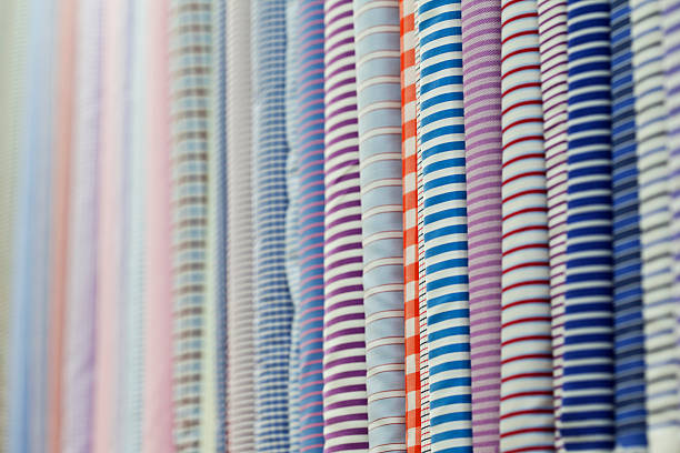 istock Rolls of multi-coloured cotton textiles. 171333734