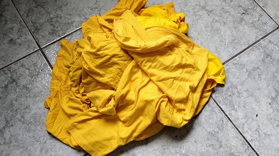 Clothes on the floor of the house