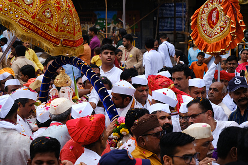 Pune, India - September 29, 2023, Shri Kasba Ganpati Ganpati Palkhi , Ganesh immersion procession with The Rhythm of Traditional Dhol Tasha Music.