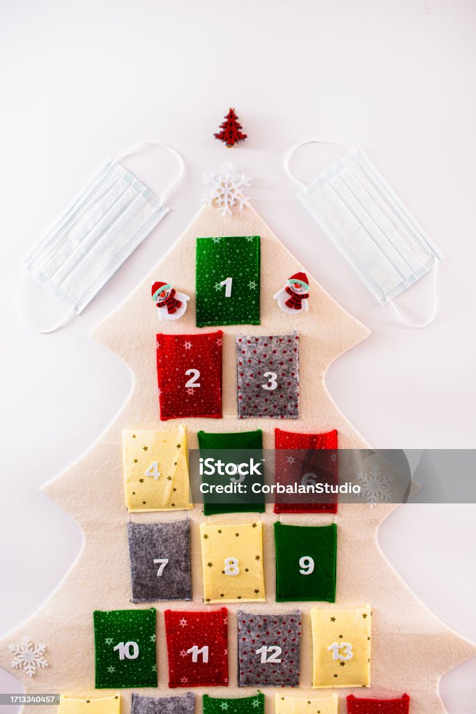 Traditional Advent Calendar Protected With Medical Face Masks Isolated