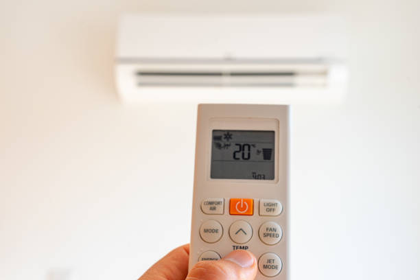 istock remote control command for air conditioning to be handled point to the device with the order to 20C° 1713342798