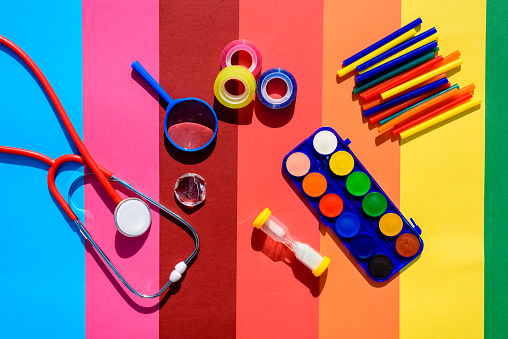 Simple plastic materials and school supplies in bright colors.
