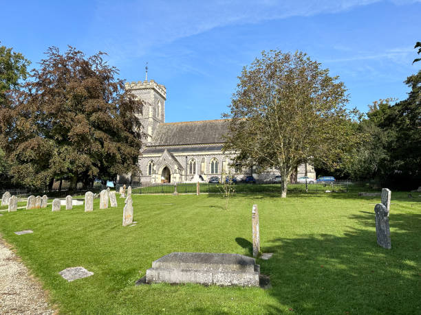 St. John the Evangelist Church in West Meon village street view in Hampshire, England, UK West Meon, Hampshire, England, UK - 29.09.2023. St. John the Evangelist Church in West Meon village street view in Hampshire, England, UK petersfield stock pictures, royalty-free photos & images