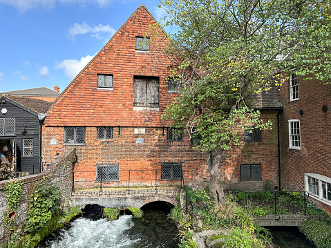 Winchester city mill view Hampshire England medieval architecture Bridge over Itchen river. England, UK.