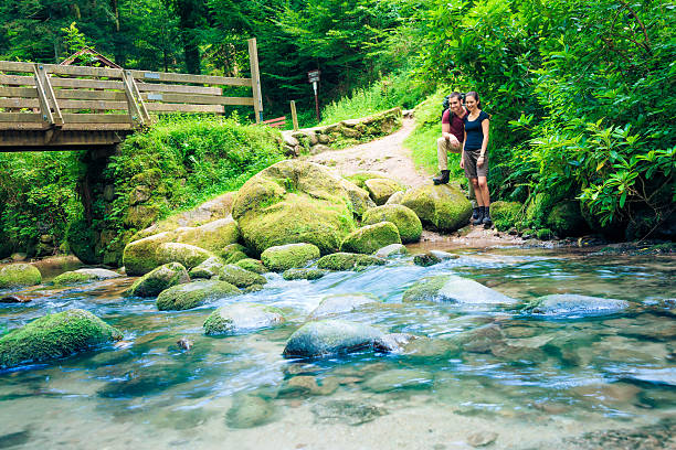 istock young couple hiking 171335068